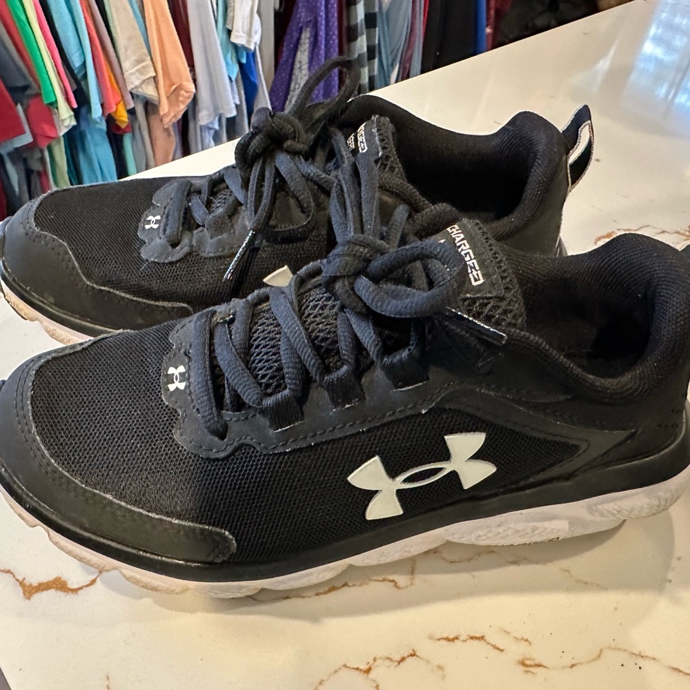 Under Armour women’s Black and White Sneakers